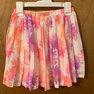 Pink floral skirt.